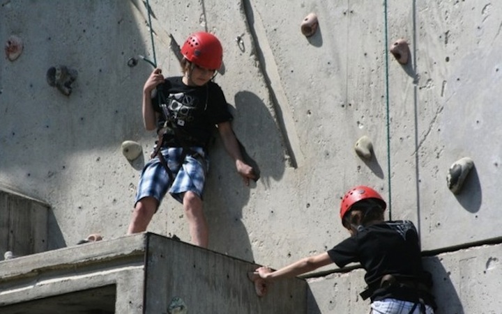 Home Page Features - Two boys on climbing wall